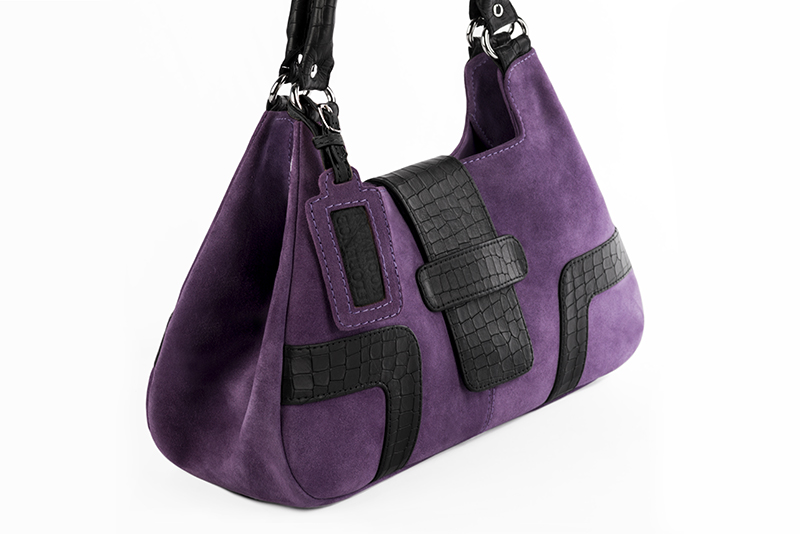 Handcrafted women's luxurious elegant handbag in premium amethyst purple and satin black leather. Perfect for elevated everyday style.   
                Choose from our luxurious collections of leather and fabric to perfectly match your handbags to your outfits.